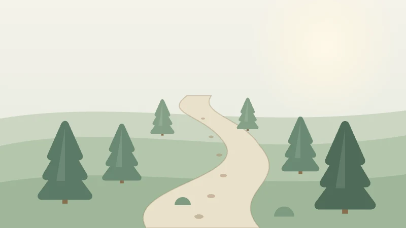 A still stand of pines with a faint pale trail winding between them